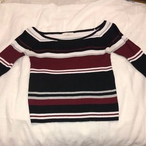 Long sleeve form fitting top.